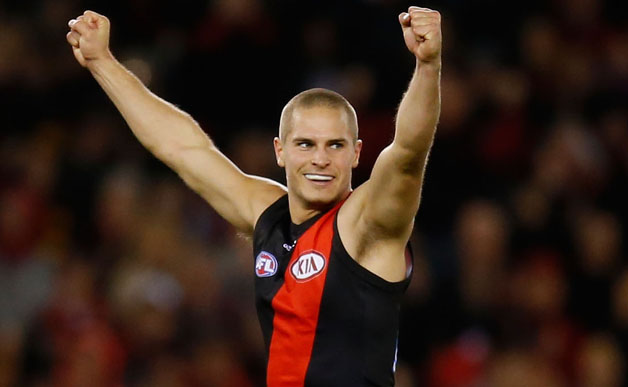 David Zaharakis of the Bombers celebrates a goal during the 2013 AFL Round 15 match between the Essendon Bombers and Port Adelaide Power at Etihad Stadium, Melbourne on July 07, 2013. (Photo: Lachlan Cunningham/AFL Media)